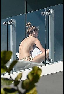 Roosmarijn de Kok sunbathing topless on her balcony in Miami Roosmarijn de Kok sunbathing topless on her balcony in Miami