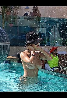 Tao Wickrath in bikini and topless at a pool party in Vegas Tao Wickrath in bikini and topless at a pool party in Vegas
