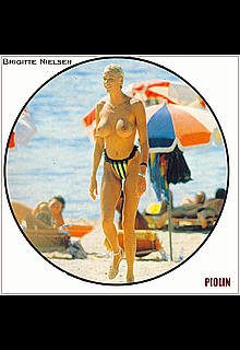 Danish actress, model, singer and reality television personality Brigitte Nielsen topless on a beach Danish actress, model, singer and reality television personality Brigitte Nielsen topless on a beach