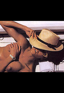 Supermodel Elle Macpherson sunbathing topless Supermodel Elle Macpherson sunbathing topless