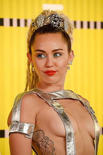 Miley Cyrus almost topless and nude ass at MTV Video Music Awards