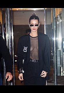 Bella Hadid in a see through black top under jacket Bella Hadid in a see through black top under jacket
