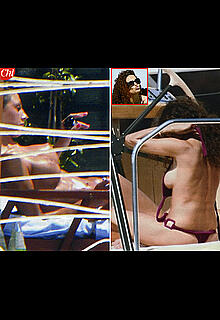 Anna Tatangelo sunbathing topless paparazzi photos