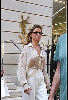 Brooks Nader braless and pokies while exiting YSL store in Paris