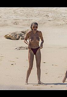 Brooks Nader topless on the beach in Cabo San Lucas