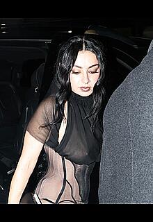 Charli XCX braless in sheer dress arrives at the Warner Music Brit Awards after party at Claridges Hotel in London
