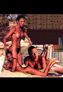 Federica Torti topless on a beach paparazzi photos