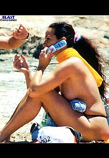Gabriella Labate topless on a beach paparazzi photos
