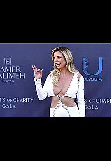 Heidi Klum cleavage at Knights of Charity Gala in Cannes
