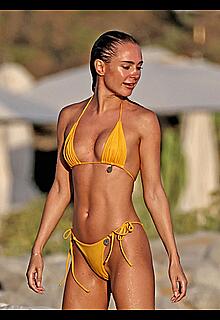 Kimberley Garner in yellow bikini enjoys a sunny beach day in Ibiza - August 18, 2026
