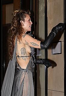 Miley Cyrus in a sheer dress in Paris