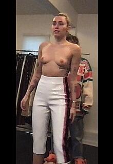 Miley Cyrus topless in Superbowl Dressing Room