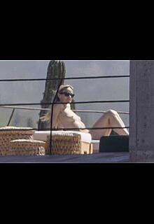 Olivia Wilde soaking up in the sun topless in Mexico - February 11, 2026