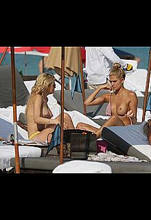 Shayna Terese Taylor and Kristen Nicole topless on a beach