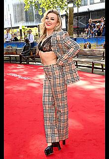 Tallia Storm in sheer bra attends the Off The Rails World premiere at Odeon Luxe Leicester Square in London