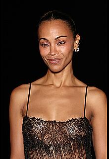 Zoe Saldana braless in sheer dress at Saint Laurent Womenswear Spring∕Summer 2027 show at Paris Fashion Week - September 29, 2026