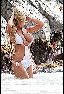 Busty Jenna Bentley boob out from white monokini Busty Jenna Bentley boob out from white monokini