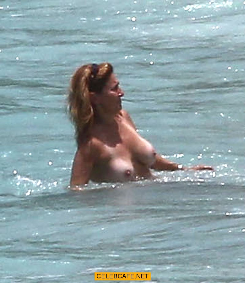 Judge Marilyn Milian caught topless at a Caribbean Beach.