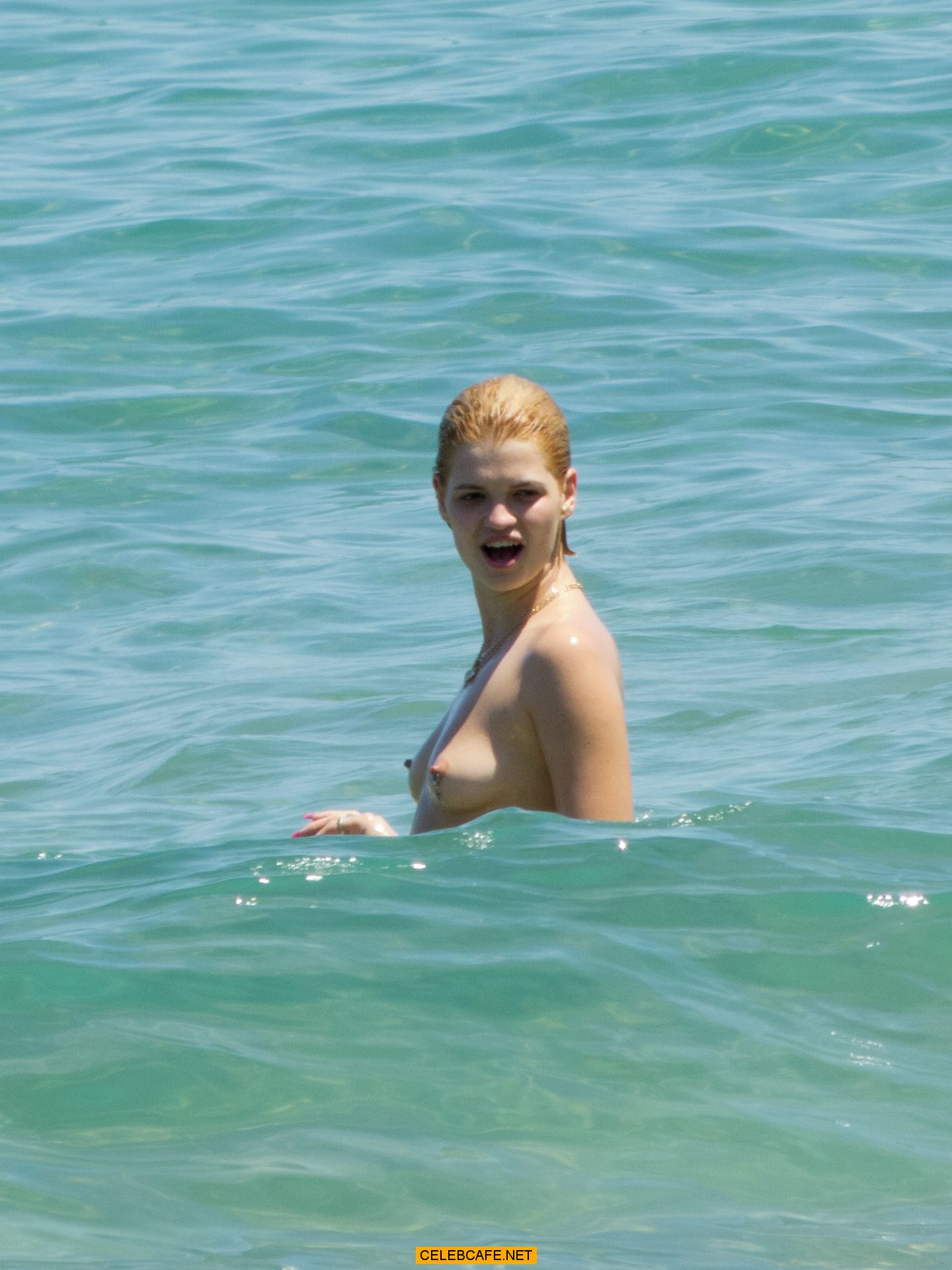 Pixie geldof strips down to a skimpy bikini during getaway with husband george barnett in majorca