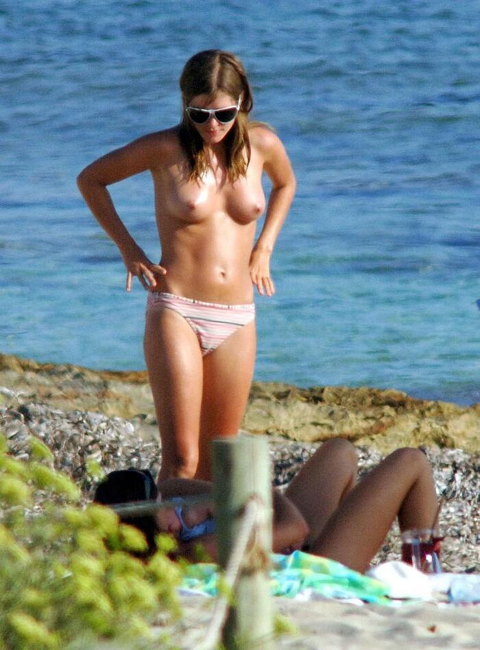 Sadie Frost topless on a beach paparazzi photo