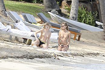 Edita Vilkeviciute sunbathing topless in St Barts