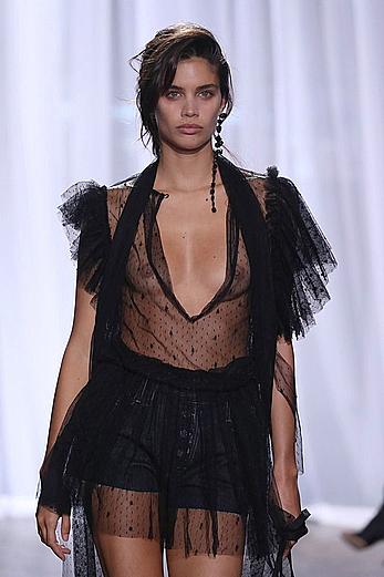 Sara Sampaio wears a see through black dress at the Zadig & Voltaire SpringSummer 2018