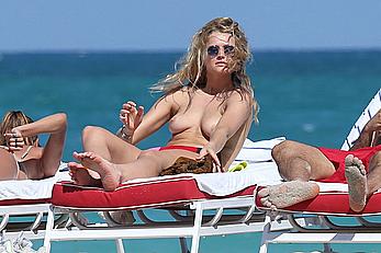 Toni Garrn topless on a beach in Miami