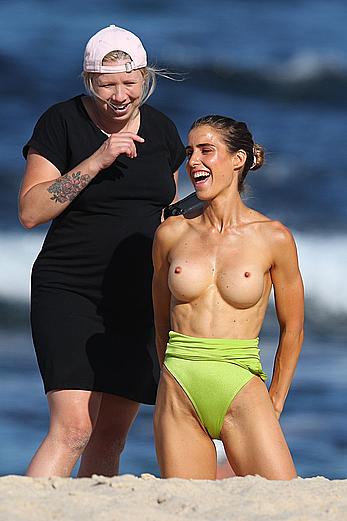 Claudia Jovanovski topless for a photoshoot on a beach in Sydney