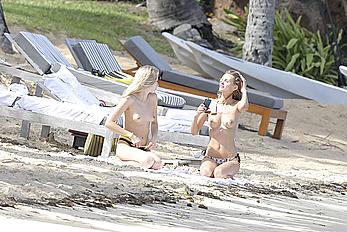 Edita Vilkeviciute sunbathing topless in St Barts