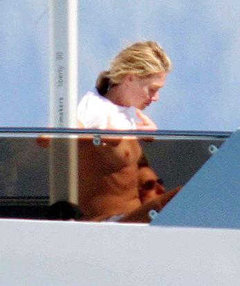 Portia de Rossi topless on a yacht paparazzi pics