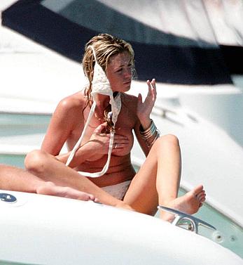 Abigail Clancy caught topless on a yacht