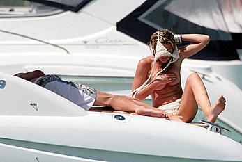 Abigail Clancy caught topless on a yacht