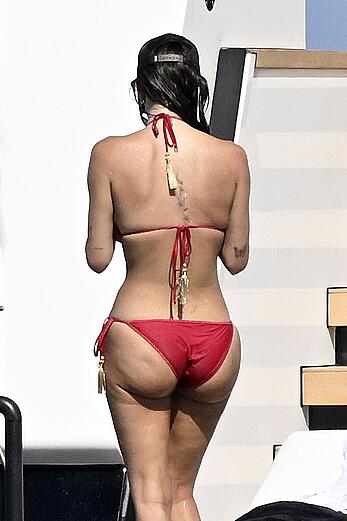 Anastasia Karanikolaou in red bikini on a yacht in Sardinia - August 13, 2026