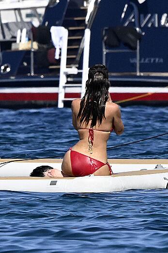 Anastasia Karanikolaou in red bikini on a yacht in Sardinia - August 13, 2026