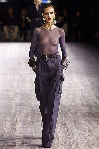 Anja Rubik walks runway in see through top at the Saint Laurent Fashion Show in Paris