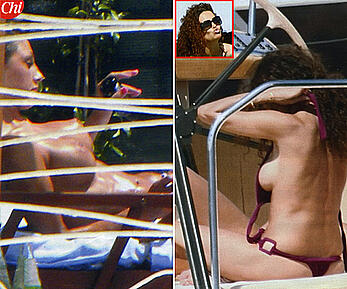 Anna Tatangelo sunbathing topless paparazzi photos