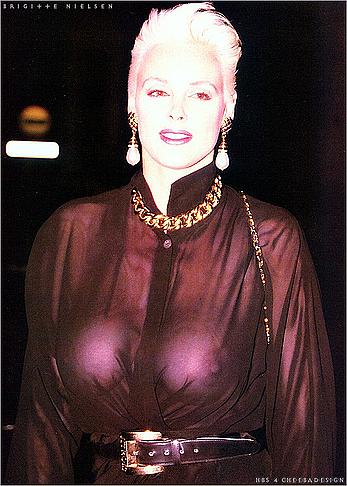 Danish actress Brigitte Nielsen braless in see through dress