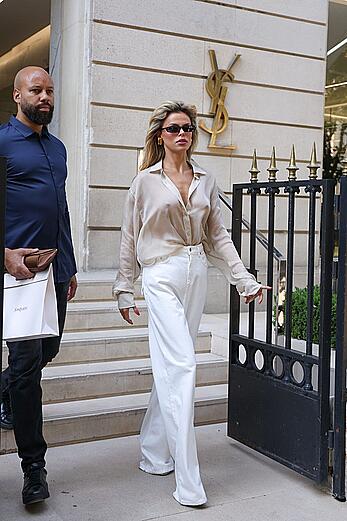 Brooks Nader braless and pokies while exiting YSL store in Paris