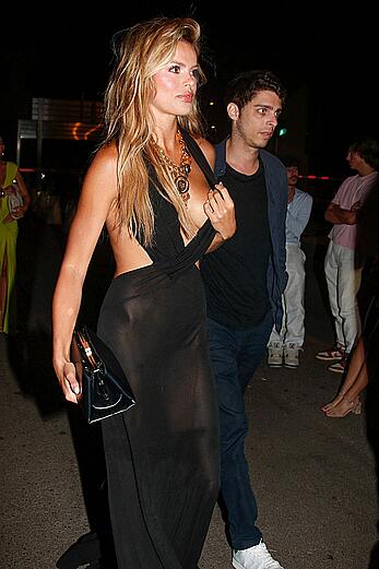 Brooks Nader areola slip outside of the VIP Room in St. Tropez