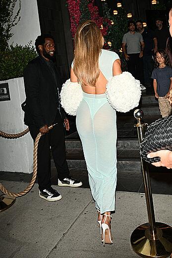 Brooks Nader in see through dress arrives to a Los Angeles Party