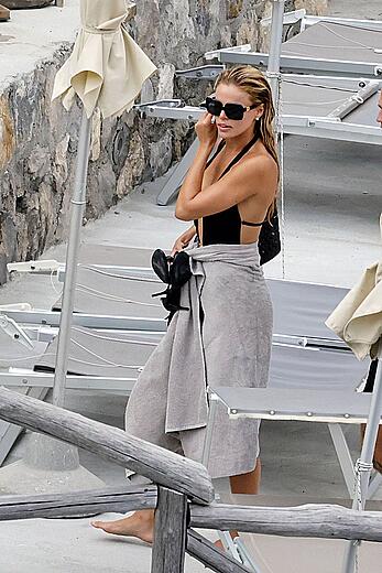 Brooks Nader nipple slip during a beach day in Capri, Italy - August 12, 2026