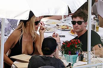 Brooks Nader nipple slip during a beach day in Capri, Italy - August 12, 2026