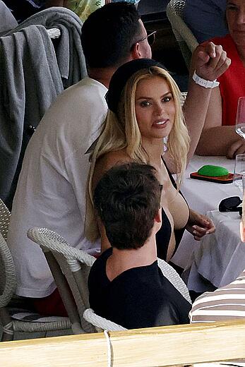 Brooks Nader nipple slip during a beach day in Capri, Italy - August 12, 2026
