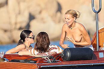 Brooks Nader goes topless in front of her parents while on holiday in Sardinia - August 09, 2026