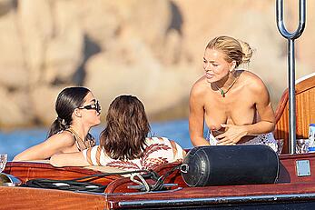 Brooks Nader goes topless in front of her parents while on holiday in Sardinia - August 09, 2026