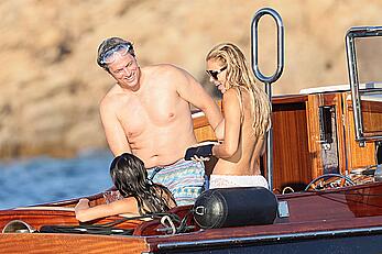 Brooks Nader goes topless in front of her parents while on holiday in Sardinia - August 09, 2026
