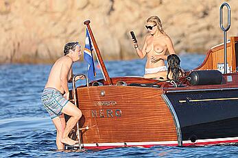 Brooks Nader goes topless in front of her parents while on holiday in Sardinia - August 09, 2026