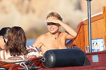 Brooks Nader goes topless in front of her parents while on holiday in Sardinia - August 09, 2026