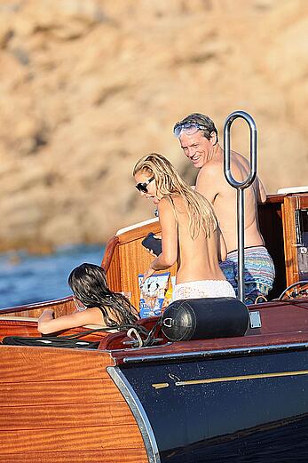 Brooks Nader goes topless in front of her parents while on holiday in Sardinia - August 09, 2026