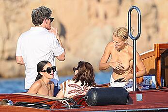 Brooks Nader goes topless in front of her parents while on holiday in Sardinia - August 09, 2026